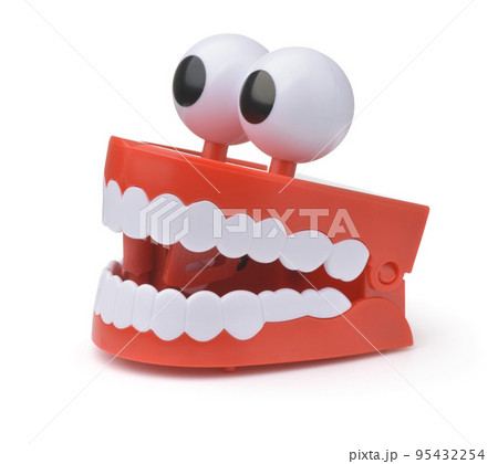 Funny toy clockwork jumping teeth with eyes 95432254