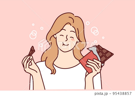 Smiling girl eating chocolate bar 95438857