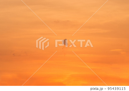 Sunset sky orange yellow color clouds background nature in the evening 95439115