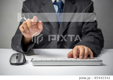 man hand searching browsing for information internet data Technology on computer keyboard notebook.SEO Search Engine Optimization. 95442342