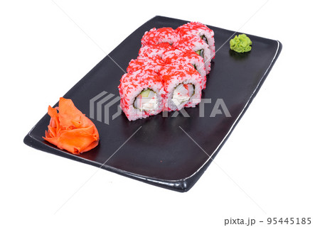 Japanese seafood Sushi roll isolated on white close up. Japanese food restaurant, sushi maki gunkan roll plate or platter set. Maki Sushi rolls with salmon and avocado. Sushi isolated at white 95445185