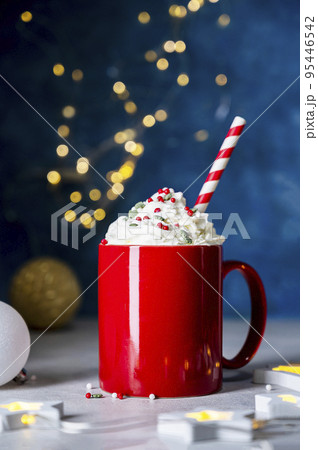 Hot chocolate with whipped cream. Seasonal, winter or Christmas coffee drink with sprinkles. 95446542