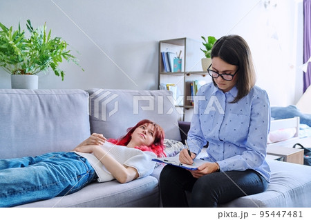 Session therapy of teenage student girl with counseling psychologist 95447481