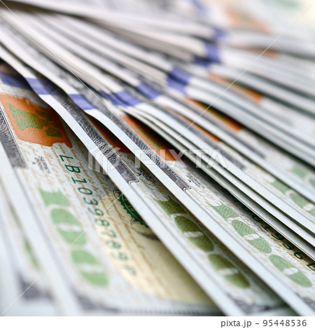 Macro shot with shallow depth of field. Hundred US dollar bills Macro shot with shallow depth of field. Hundred US dollar bills 95448536