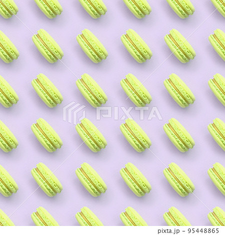 Lime dessert cake macaron or macaroon on trendy pastel lilac background top view Lime dessert cake macaron or macaroon on trendy pastel lilac background top view 95448865