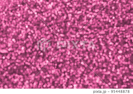 Blurred coral red decorative sequins. Background image with shiny bokeh lights from small elements Blurred coral red decorative sequins. Background image with shiny bokeh lights from small elements 95448878