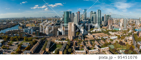 Aerial panoramic skyline view of Canary Wharf, the worlds leading financial district in London, UK. Business center of London. 95451076