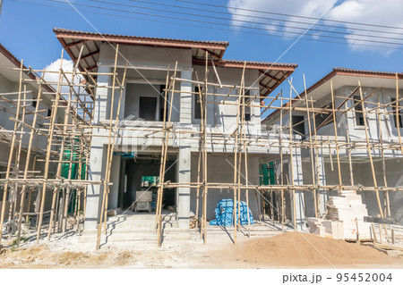 construction residential new house in progress at building site housing estate development construction residential new house in progress at building site housing estate development 95452004