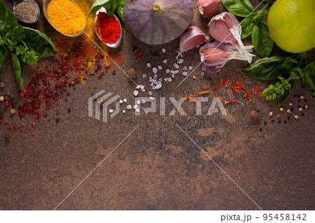 Variety of spices and herbs at table background. Cooking concept and ingredients Variety of spices and herbs at table background. Cooking concept and ingredients 95458142
