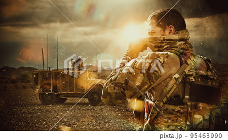Army soldier in Combat Uniforms with an assault rifle and combat helmet night mission dark background. Blue and purple gel light effect. Army soldier in Combat Uniforms with an assault rifle and combat helmet night mission dark background. Blue and purple gel light effect. 95463990