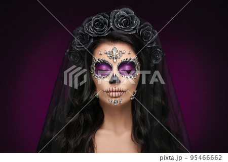 Portrait of a woman with makeup sugar skull Portrait of a woman with makeup sugar skull 95466662