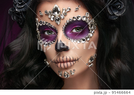 Portrait of a woman with makeup sugar skull Portrait of a woman with makeup sugar skull 95466664