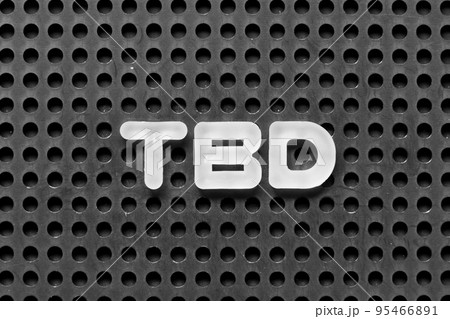 White alphabet letter in word TBD (Abbreviation of to be defined, discussed, determined, decided, deleted or declared) on black pegboard background White alphabet letter in word TBD (Abbreviation of to be defined, discussed, determined, decided, deleted or declared) on black pegboard background 95466891