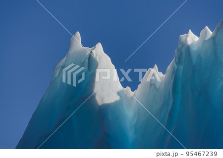 Iceberg in Greenland at summer time close up. Sunny weather. 95467239