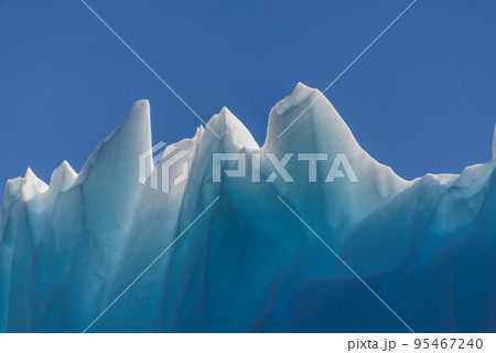 Iceberg in Greenland at summer time close up. Sunny weather. Iceberg in Greenland at summer time close up. Sunny weather. 95467240