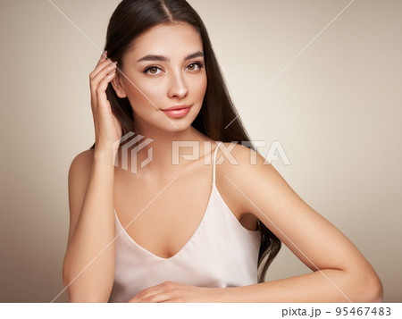 Portrait beautiful young woman with clean fresh skin Portrait beautiful young woman with clean fresh skin 95467483