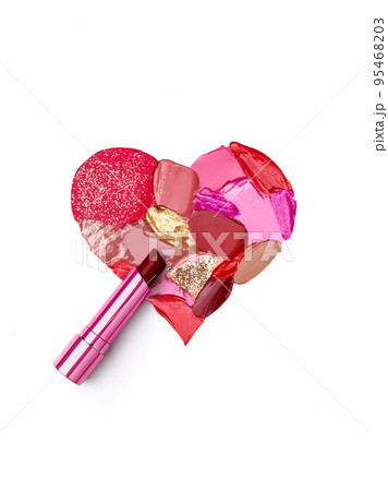 Pink lipstick smeared in the shape of heart 95468203
