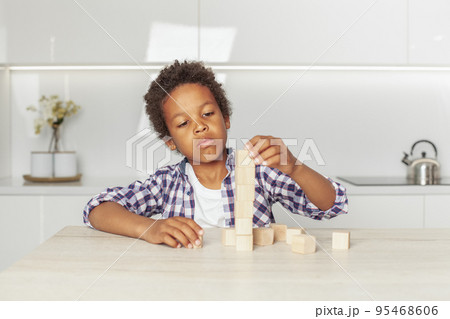 Little child playing, indoor portrait 95468606
