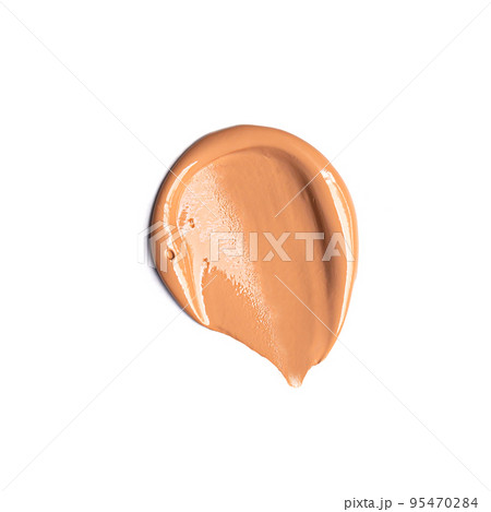 Tone cream smear swatch. Beige color cosmetic product sample 95470284