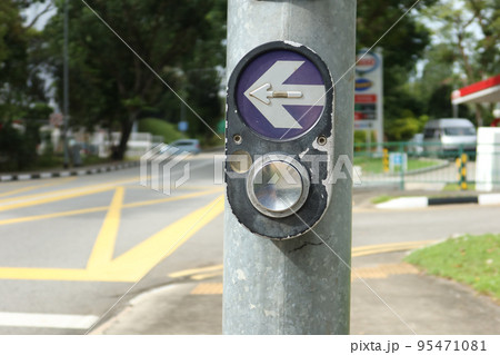 close up of crossing signal button in singapore  95471081