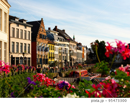 Summer view of Ghent with typical Flemish townhouses on banks of river Leie 95473300