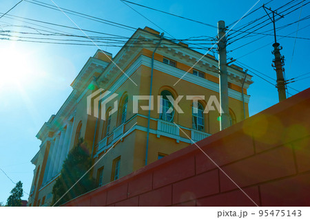 Kyiv, Ukraine - October 16, 2022: The damaged facade of a building after a Russian missile attack in the center of the capital. Kyiv, Ukraine - October 16, 2022: The damaged facade of a building after a Russian missile attack in the center of the capital. 95475143