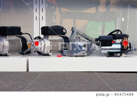 Modern electric machine motors at the exhibition. Modern electric machine motors at the exhibition. 95475499