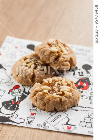 peanut cookies on a napkin on a wooden table peanut cookies on a napkin on a wooden table 95479468
