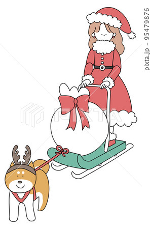 犬ぞりに乗ったサンタの衣装を着た女の子白 95479876
