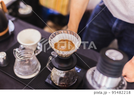 Close up drip coffee style brewing on top counter in cafe. Close up drip coffee style brewing on top counter in cafe. 95482218