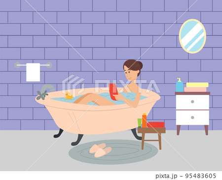 Girl lies in bathroom and surfs Internet, browsing web, searching for info. Relaxing in bathroom 95483605