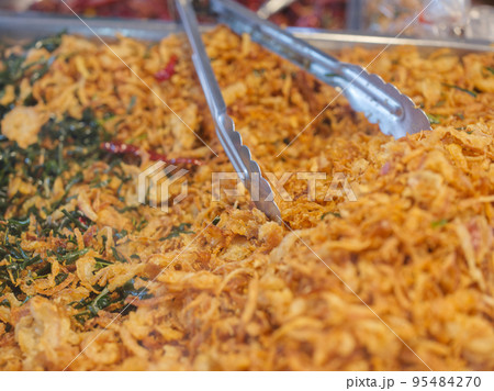 Deep fried pickled fish (Sour crispy fish) . Famous appetizer menu in THAILAND market. 95484270