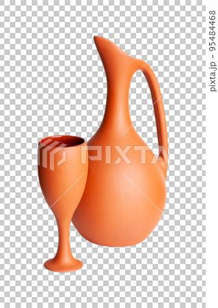 A brown clay jug with a cup isolated on a white background A brown clay jug with a cup isolated on a white background 95484468