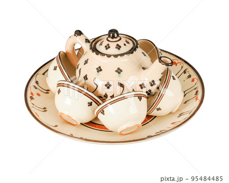 A vintage oriental ceramic teapot and cups isolated on a white background 95484485