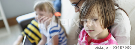 Happy mum and kid spend weekend together at home, mother entertain children 95487930