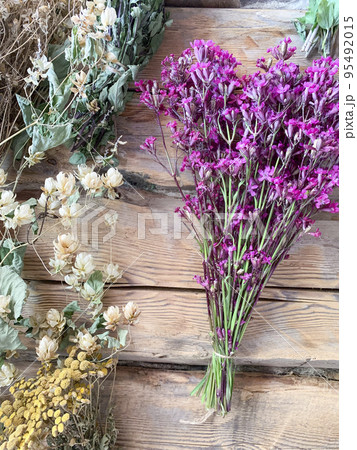 Dried medicinal flowers and herbs on wooden background. Studio Photo Dried medicinal flowers and herbs on wooden background. Studio Photo 95492015