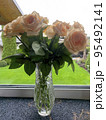 Bouquet of fresh roses in crystal vase. Studio Photo 95492141