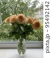Bouquet of fresh roses in crystal vase. Studio Photo 95492142