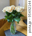 Bouquet of fresh roses in crystal vase. Studio Photo 95492144