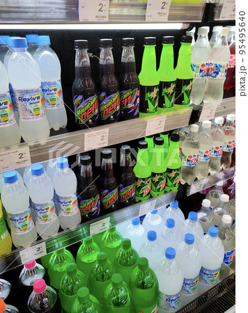 JOHOR, MALAYSIA -MARCH 1, 2022: Soft drinks or carbonated drinks displayed for sale in the supermarket. Have a price tag to make it easier for customers to buy. JOHOR, MALAYSIA -MARCH 1, 2022: Soft drinks or carbonated drinks displayed for sale in the supermarket. Have a price tag to make it easier for customers to buy. 95495640
