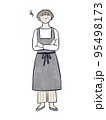 困った顔のエプロンの女性 95498173