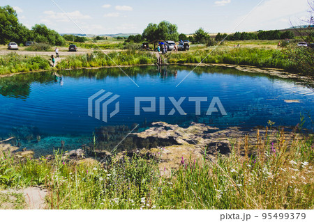 Lake with gray water. Blue lake in Samara region in Russia. Deep pond. 95499379