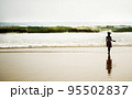 Young girl on the beach 95502837