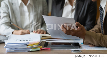 Group of Businesswoman and Accountant checking data document on laptop for investigation of corruption account Group of Businesswoman and Accountant checking data document on laptop for investigation of corruption account 95503160