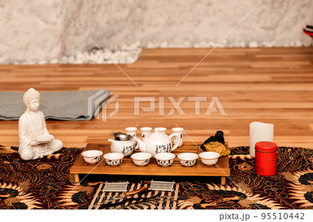 Chinese tea ceremony. A set of dishes for tea drinking Chinese tea ceremony. A set of dishes for tea drinking 95510442