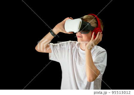 teenager use modern technologies for entertainment or education. VR musician concept 95513012