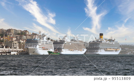 Three huge cruise ship docked at Galataport, Bosphorus, Karakoy, district, with Galata Tower, Istanbul, Turkey Three huge cruise ship docked at Galataport, Bosphorus, Karakoy, district, with Galata Tower, Istanbul, Turkey 95513809