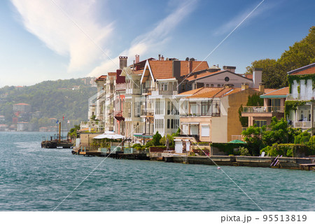 Traditional houses of the European side of Bosphorus strait, Istanbul, Turkey, with background of green mountains Traditional houses of the European side of Bosphorus strait, Istanbul, Turkey, with background of green mountains 95513819