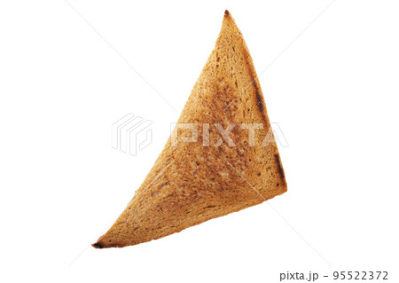 One slice of lightly toasted bread isolated on a white background. Sliced toast bread. One slice of lightly toasted bread isolated on a white background. Sliced toast bread. 95522372