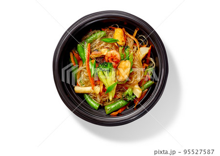 Chinese stir fried rice noodles with shrimps, mussels, squid, broccoli, carrots and green beans 95527587